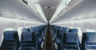 blue airplane interior with seats