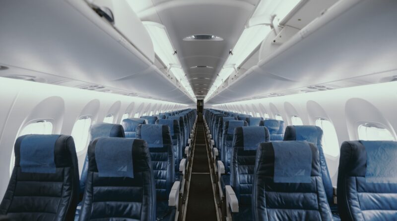 blue airplane interior with seats