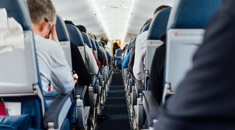 people sitting inside plane