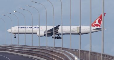white passenger plane on airport during daytime